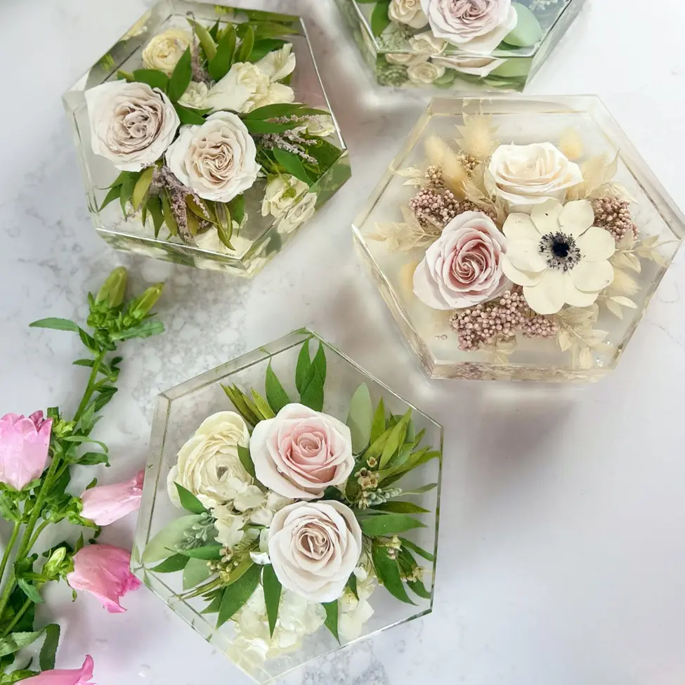 Three hexagon resin keepsakes with blush and ivory roses
